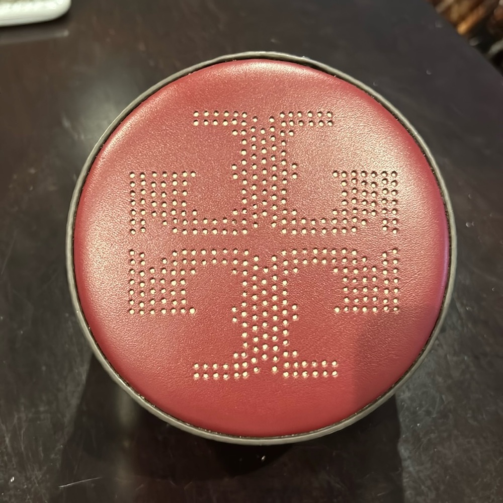 Tory Burch round perforated travel case